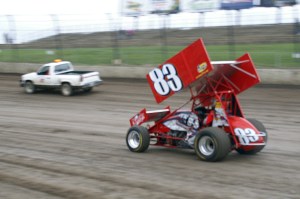 Tim Shaffer warms up his no.83 machine on a damp night.