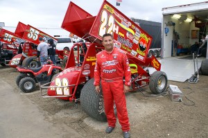 Randy Hannagan strikes a pose next to his Dennis Yokam no.22H machine.
