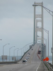 On a hazy Michigan day, Keselowski made history by driving his Penske Ford across one of Michigan's most iconic features.