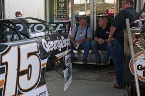 Barry Wright relaxes behind Steve Francis' no.15 machine before the evenings events.