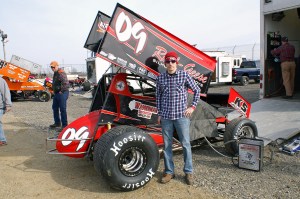 Craig Mintz proudly poses by his no.09 410 Sprinter.